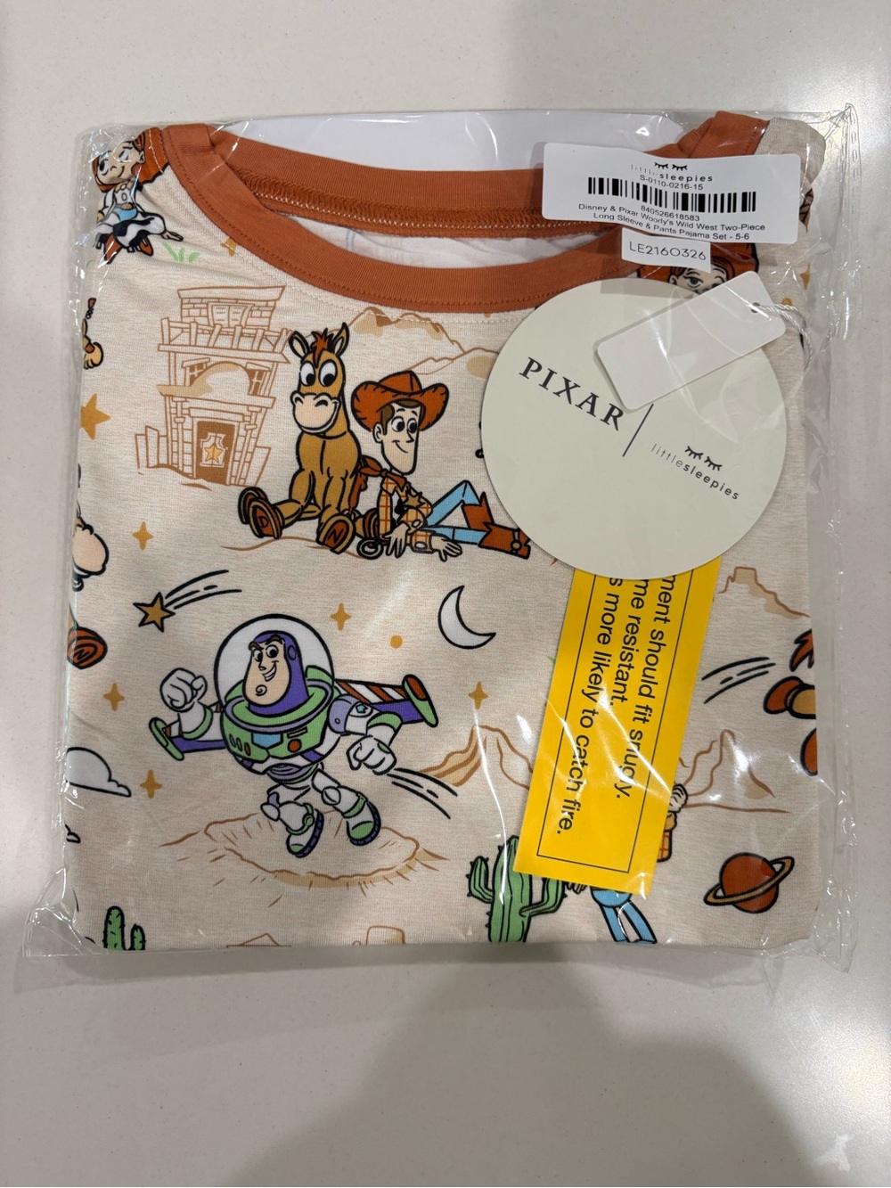 Little Sleepies Toy Story Pajama Set - Cream & Rust Trim